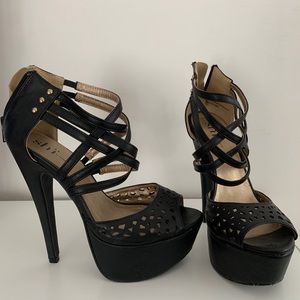 Strappy black platform heels